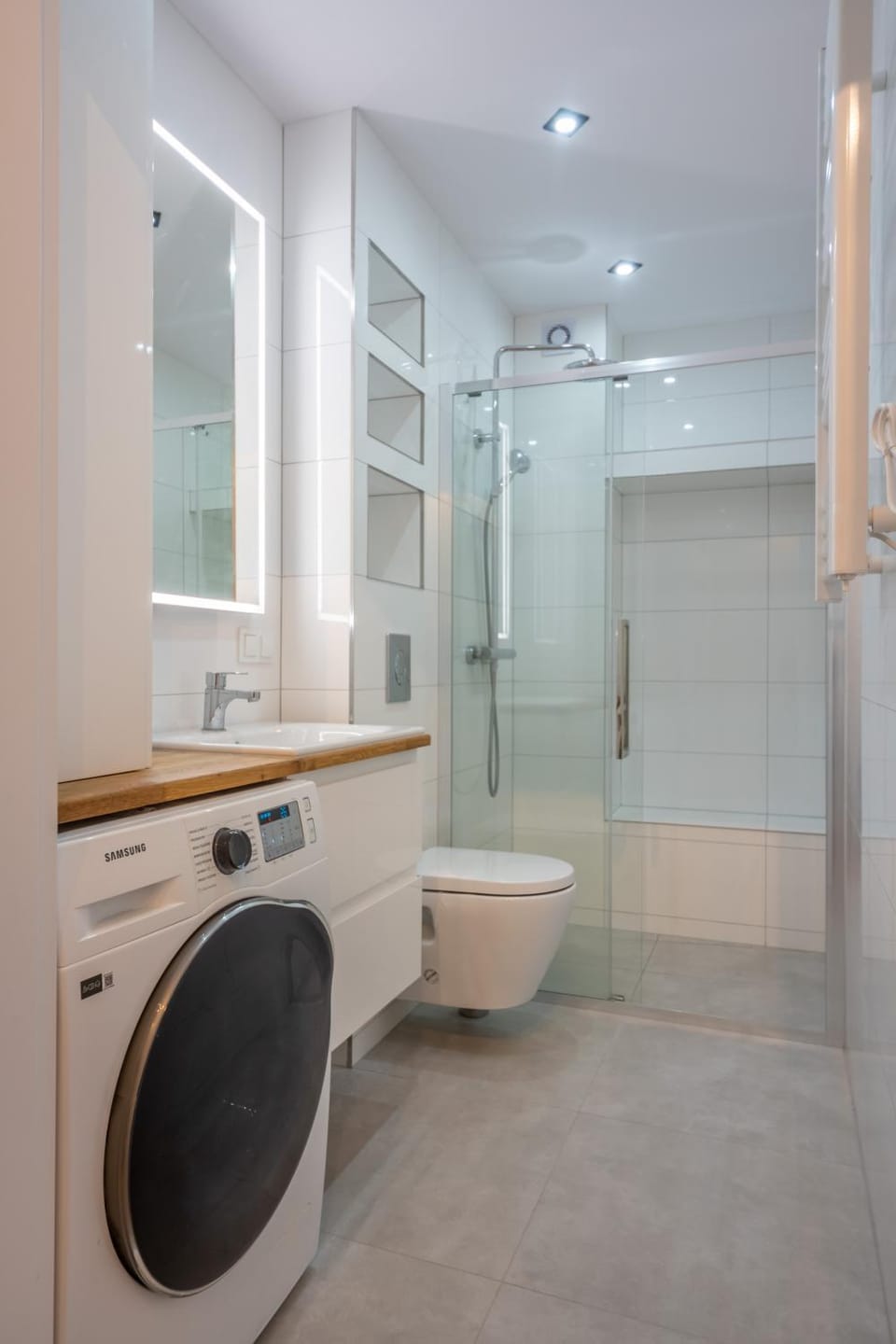 Shower, Toilet, Bathroom, towels, washing machine, dryer