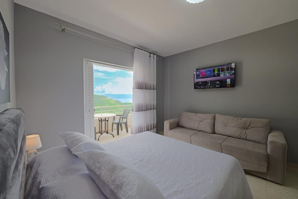 Bed, Living room, Seating area, Bedroom