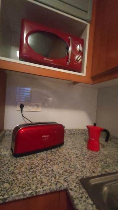 Kitchen or kitchenette, toaster