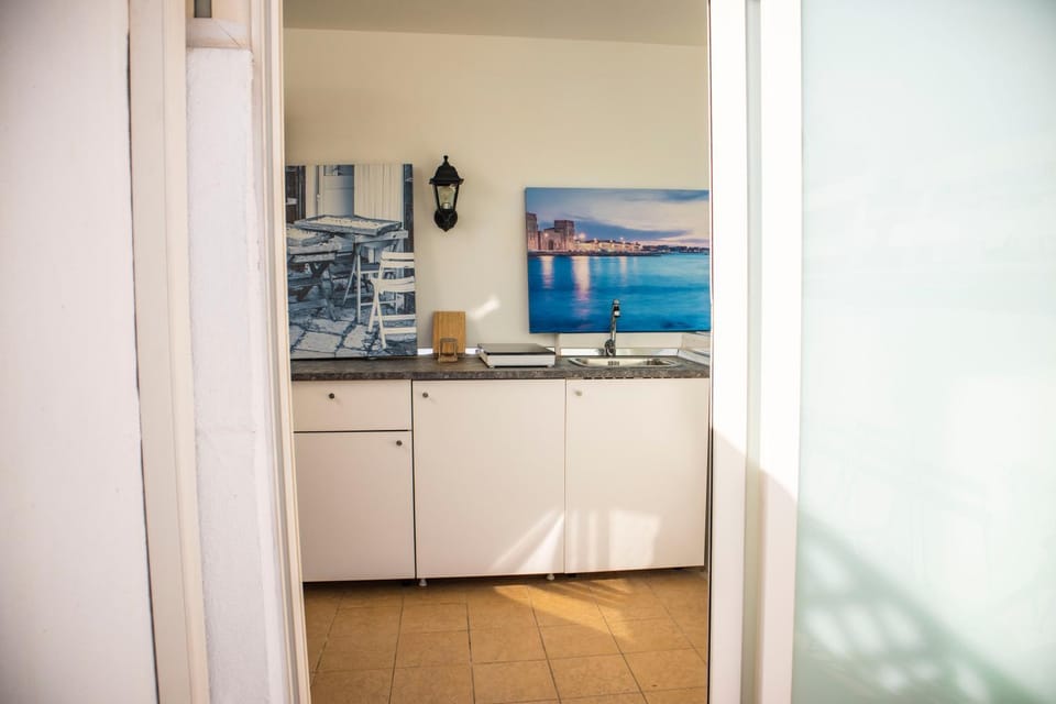 Kitchen or kitchenette, stove