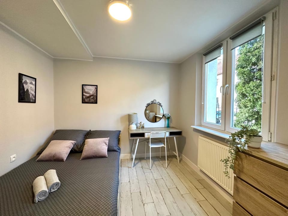 Bed, Photo of the whole room, hair dresser, towels