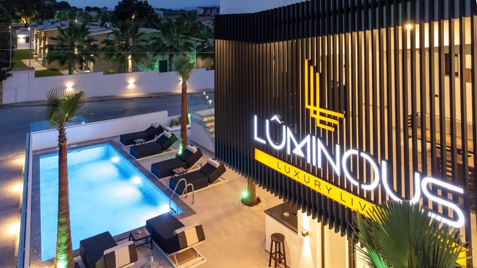 Property building, Patio, Night, Natural landscape, Pool view, Swimming pool