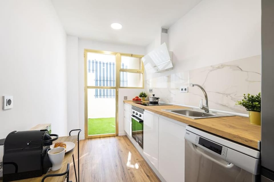 Kitchen or kitchenette, dishwasher, oven, stove, toaster