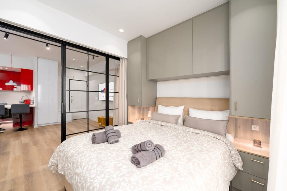 Bed, Living room, Photo of the whole room, Seating area, Bedroom, towels, wardrobe