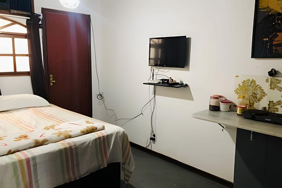 apartamento fica perto da praia posto 12 pequeno porem acnvhegante Apartment in Rio de Janeiro