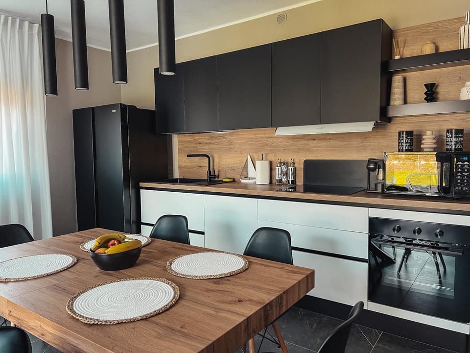 Kitchen or kitchenette, dishwasher, microwave, oven