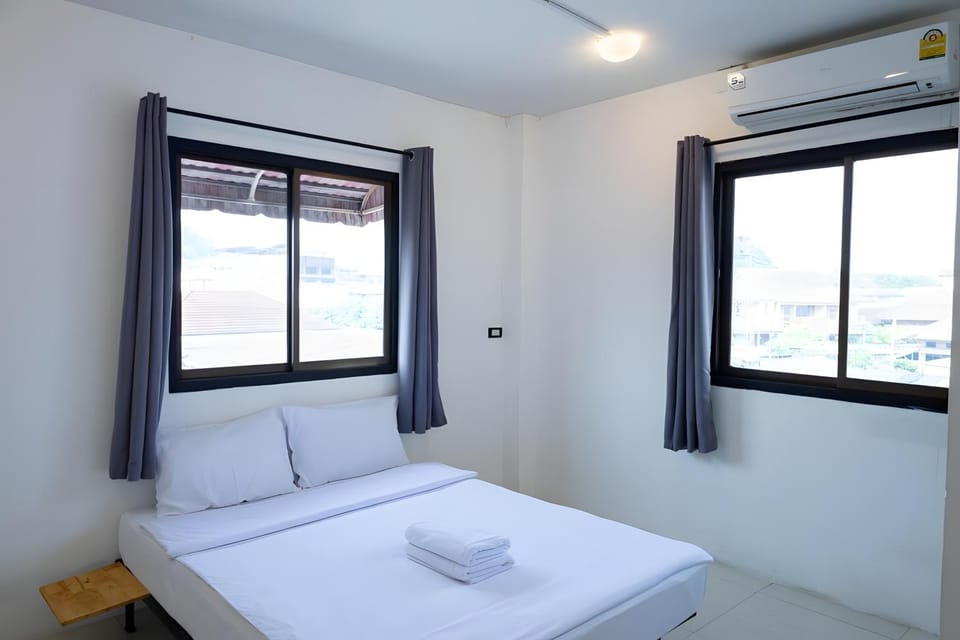 Bed, Photo of the whole room, Bedroom, towels, air conditioner