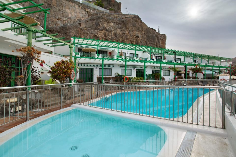 Property building, Living room, Swimming pool