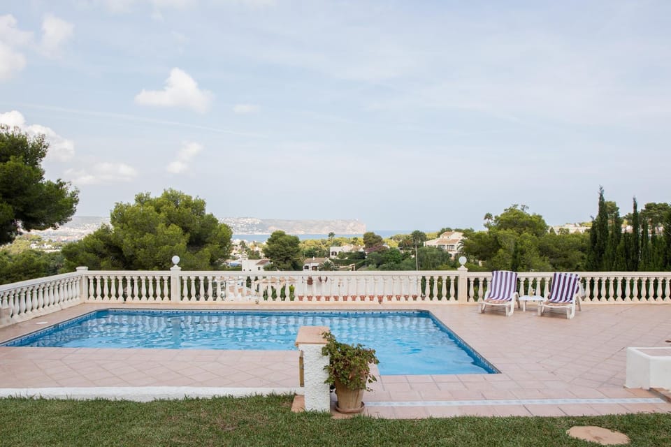 Property building, Living room, Swimming pool