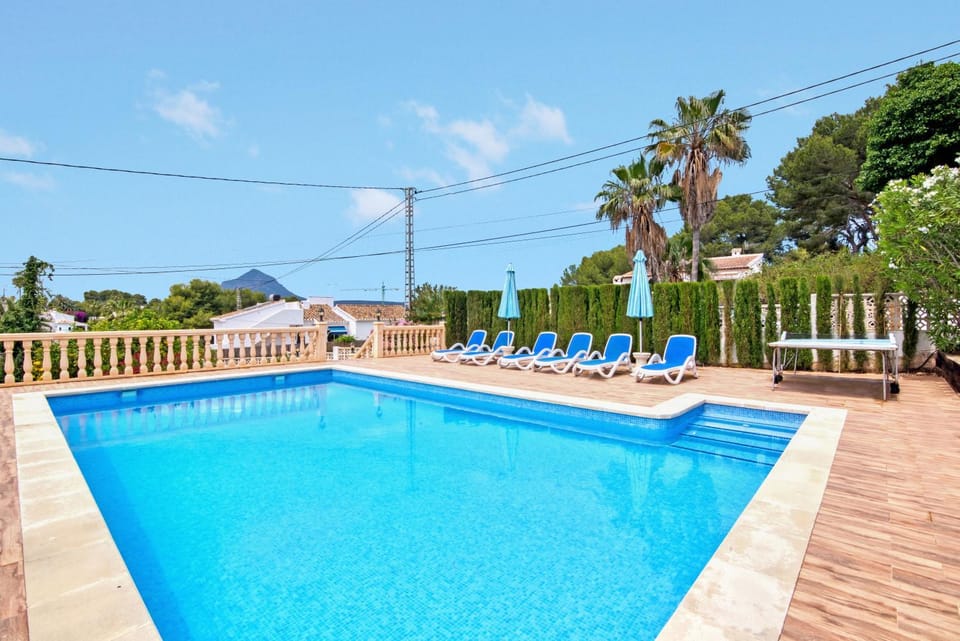 Property building, Living room, Swimming pool