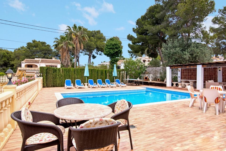 Property building, Living room, Swimming pool