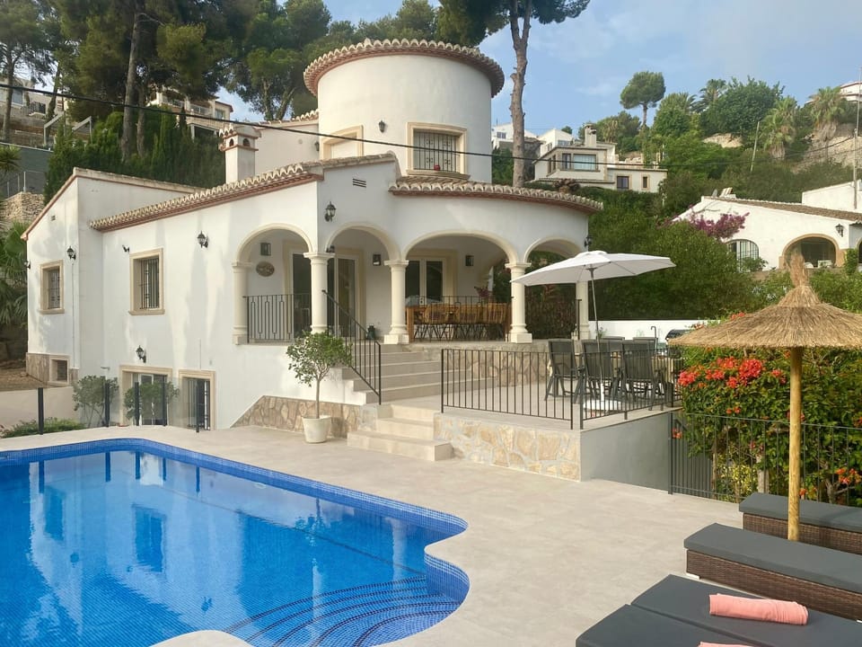 Property building, Living room, Swimming pool