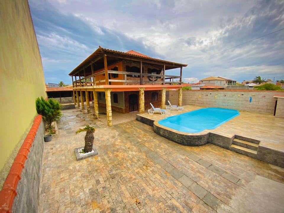 Property building, Patio, Day, View (from property/room), Balcony/Terrace, Pool view, Swimming pool, sunbed