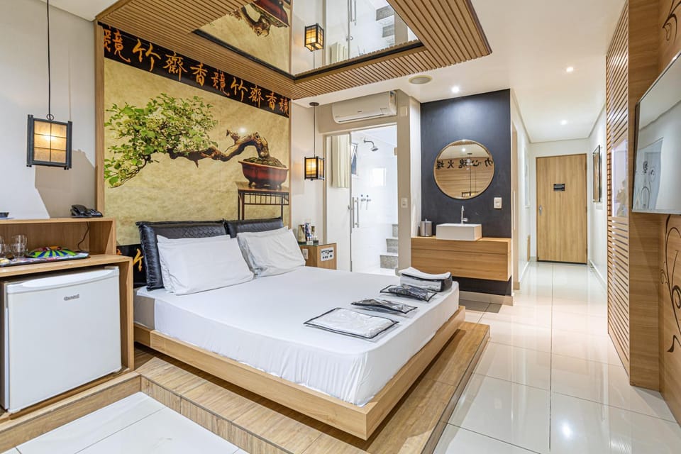 Photo of the whole room, bidet, oven, air conditioner