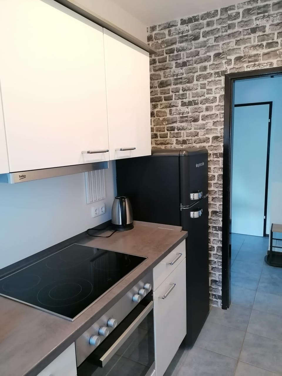 Kitchen or kitchenette, oven, stove