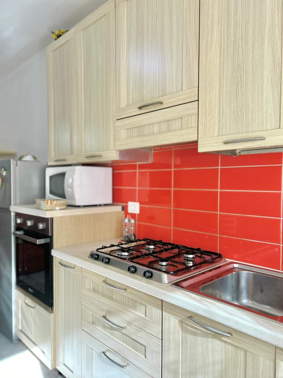 Kitchen or kitchenette, stove