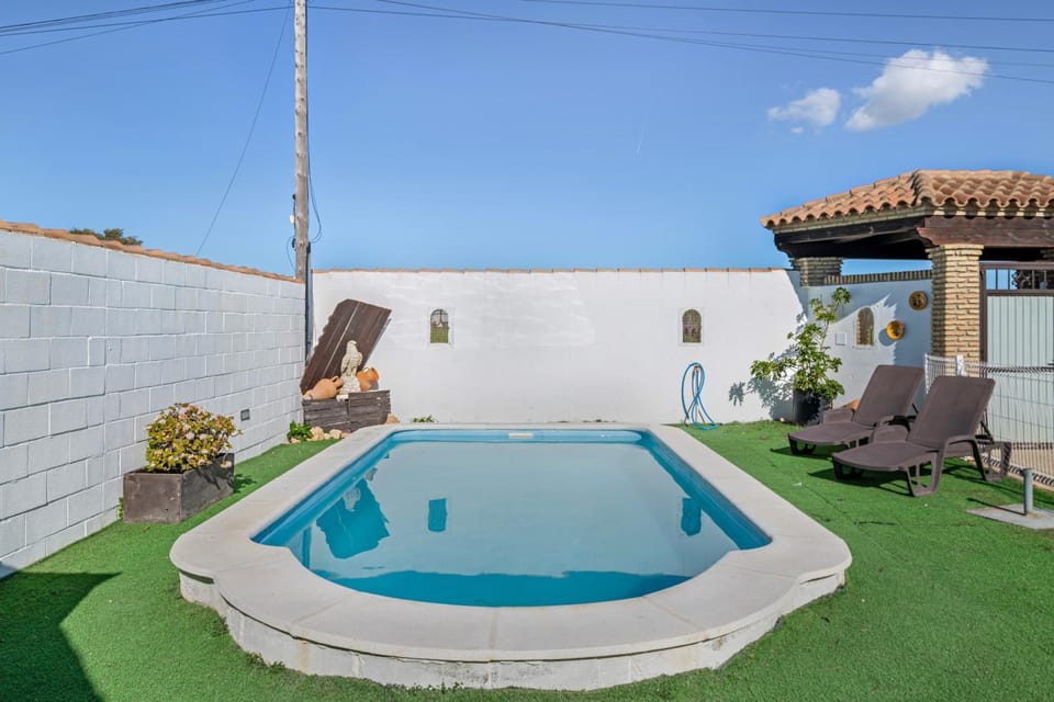 Property building, Living room, Swimming pool