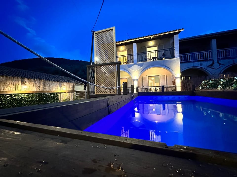 Property building, Night, Pool view, Swimming pool