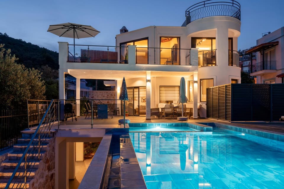 Property building, Patio, Night, Pool view, Swimming pool