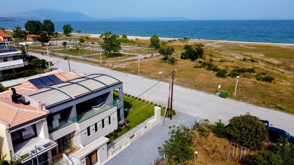 Property building, Spring, Natural landscape, Bird's eye view, Beach, Sea view, Street view