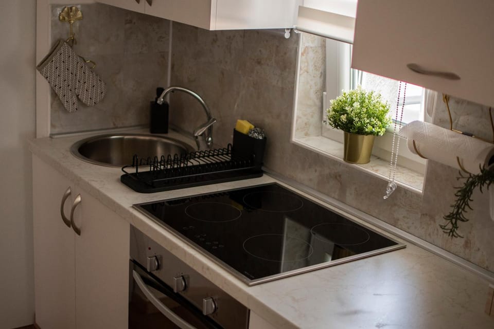 Kitchen or kitchenette, stove