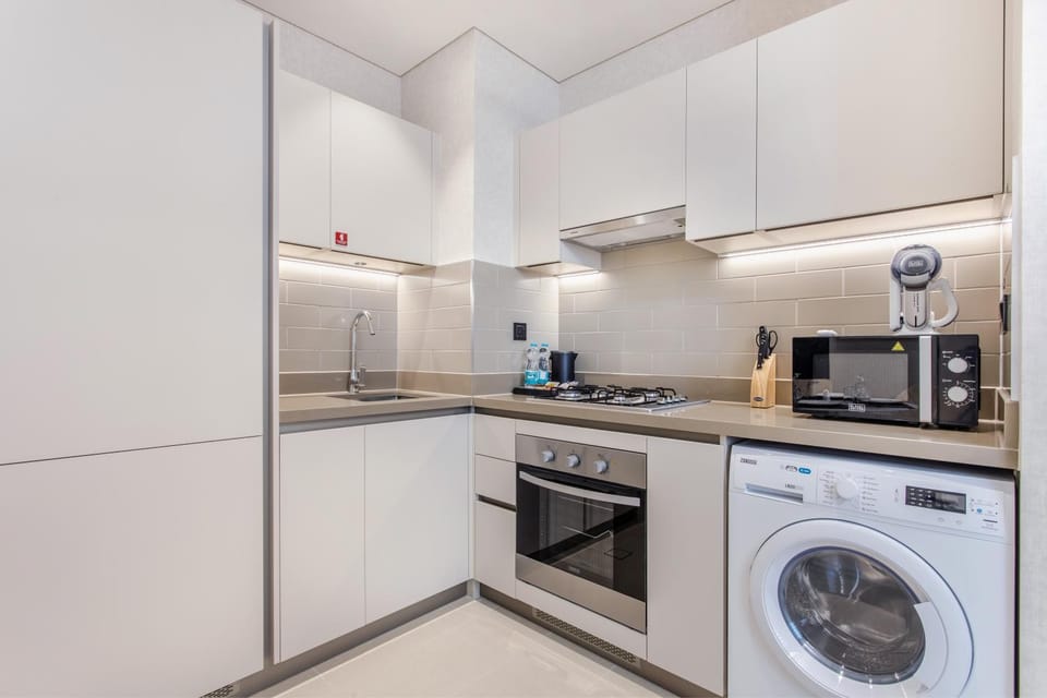 Coffee/tea facilities, Kitchen or kitchenette, minibar, stove, washing machine