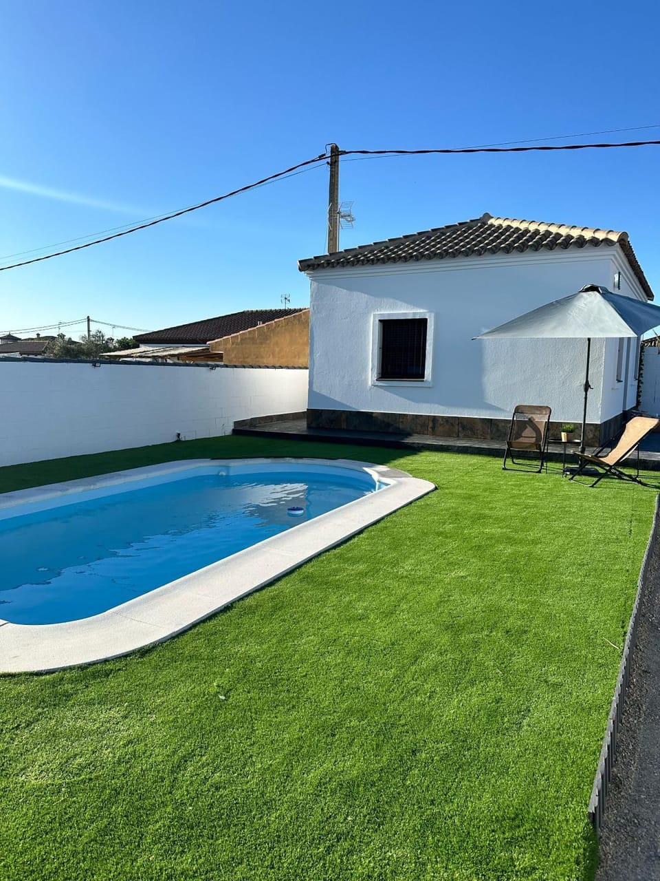 Property building, Garden, Pool view, Swimming pool, sunbed