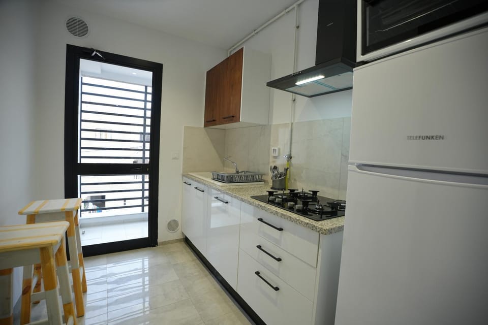 Kitchen or kitchenette, oven, stove