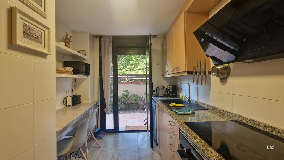 Kitchen or kitchenette, dishwasher, oven, stove