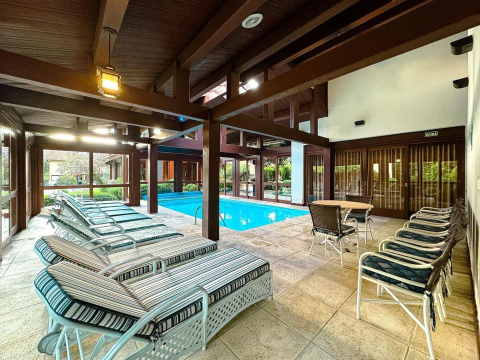 Villa Del Fiori com Piscina Aquec by Achei Gramado House in Gramado
