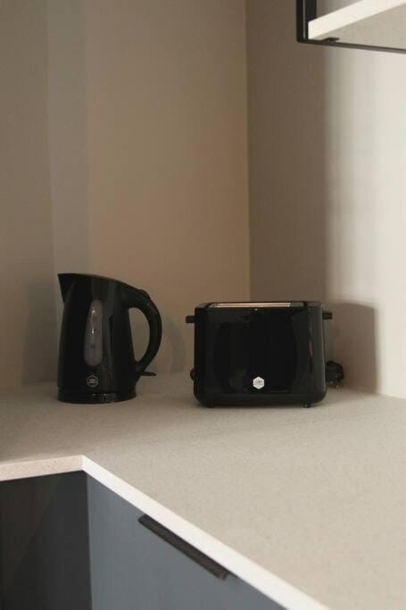 Kitchen or kitchenette, toaster