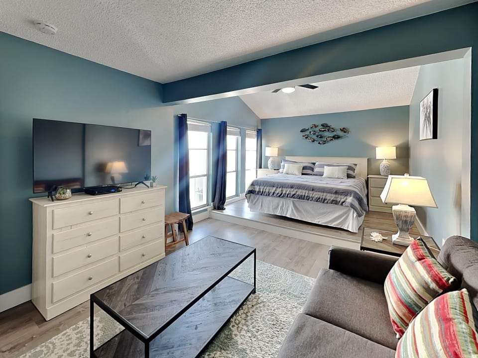 Bed, TV and multimedia, Living room, Seating area, Bedroom, furniture, wardrobe