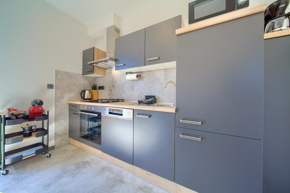 Kitchen or kitchenette, oven, stove, toaster