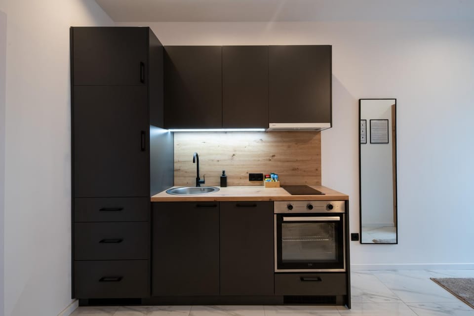 Kitchen or kitchenette, oven, stove