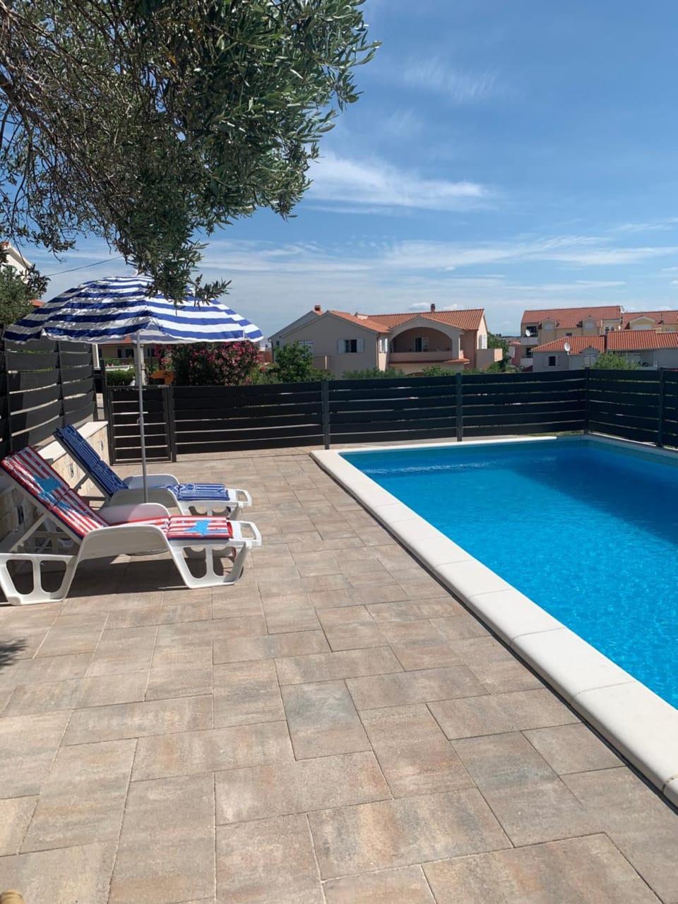 Patio, Day, Pool view, Swimming pool, sunbed