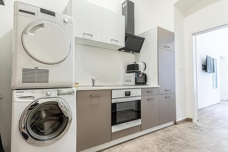 microwave, oven, toaster, washing machine, dryer, kitchen
