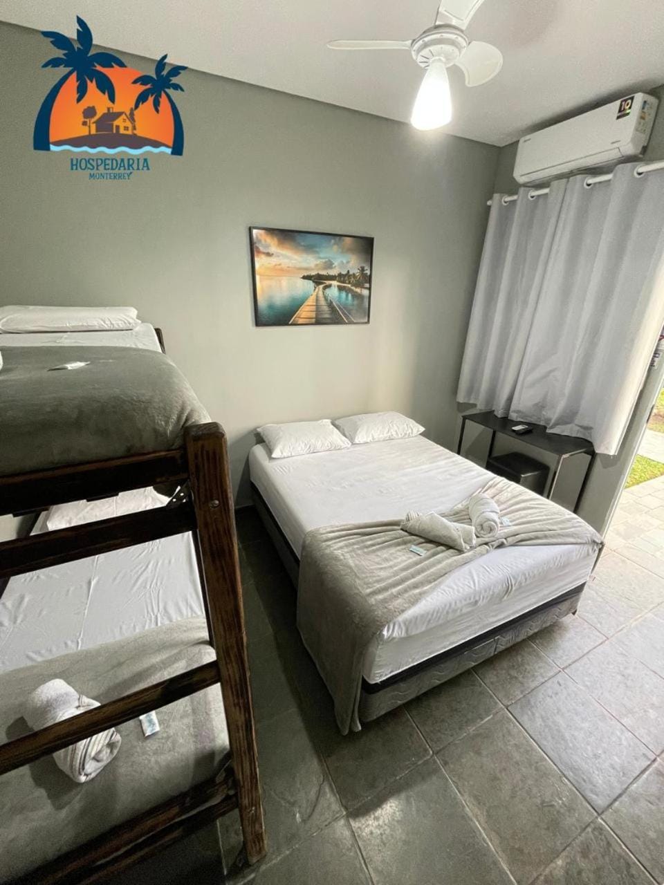 Bed, Photo of the whole room, Decorative detail, Bedroom, bunk bed, towels, air conditioner