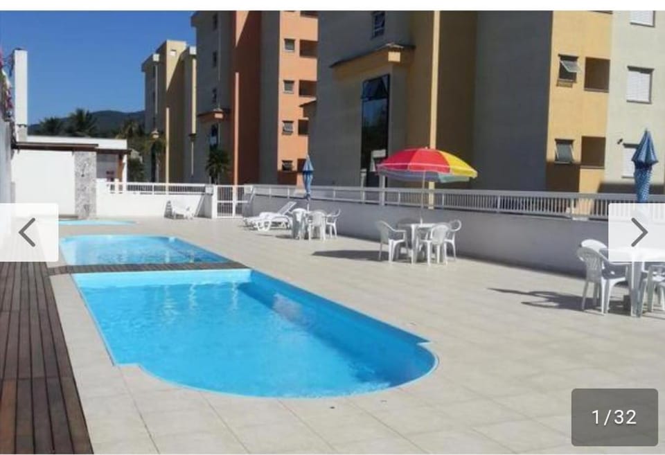 Property building, Patio, Day, Pool view, Swimming pool, sunbed