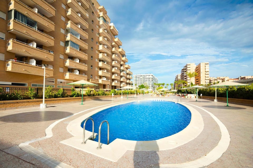 Property building, Patio, Day, Pool view, Swimming pool, Entertainment, Inner courtyard view, sunbed