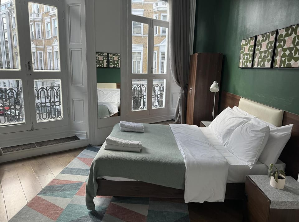 Bed, Photo of the whole room, Decorative detail, Bedroom, towels, wardrobe
