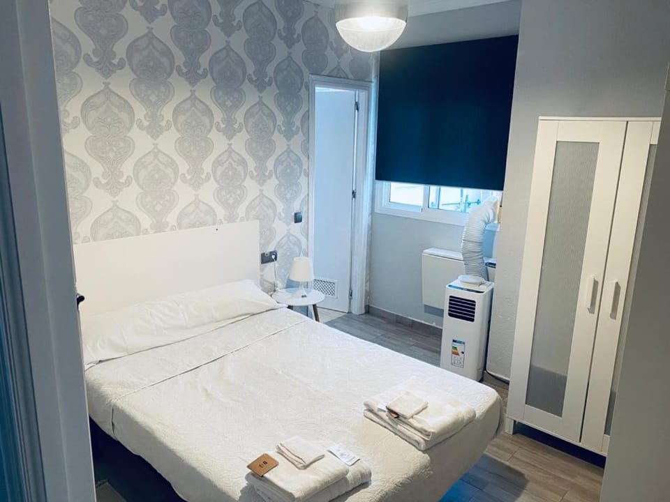 Bed, Photo of the whole room, Bedroom, towels, wardrobe
