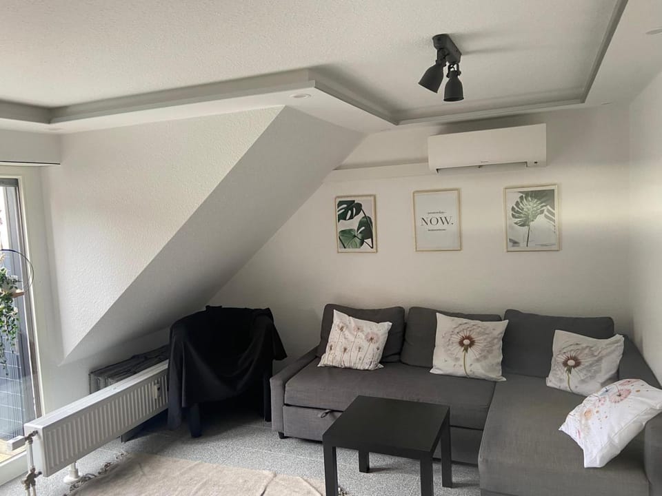 Bed, Living room, Seating area, Bedroom, air conditioner