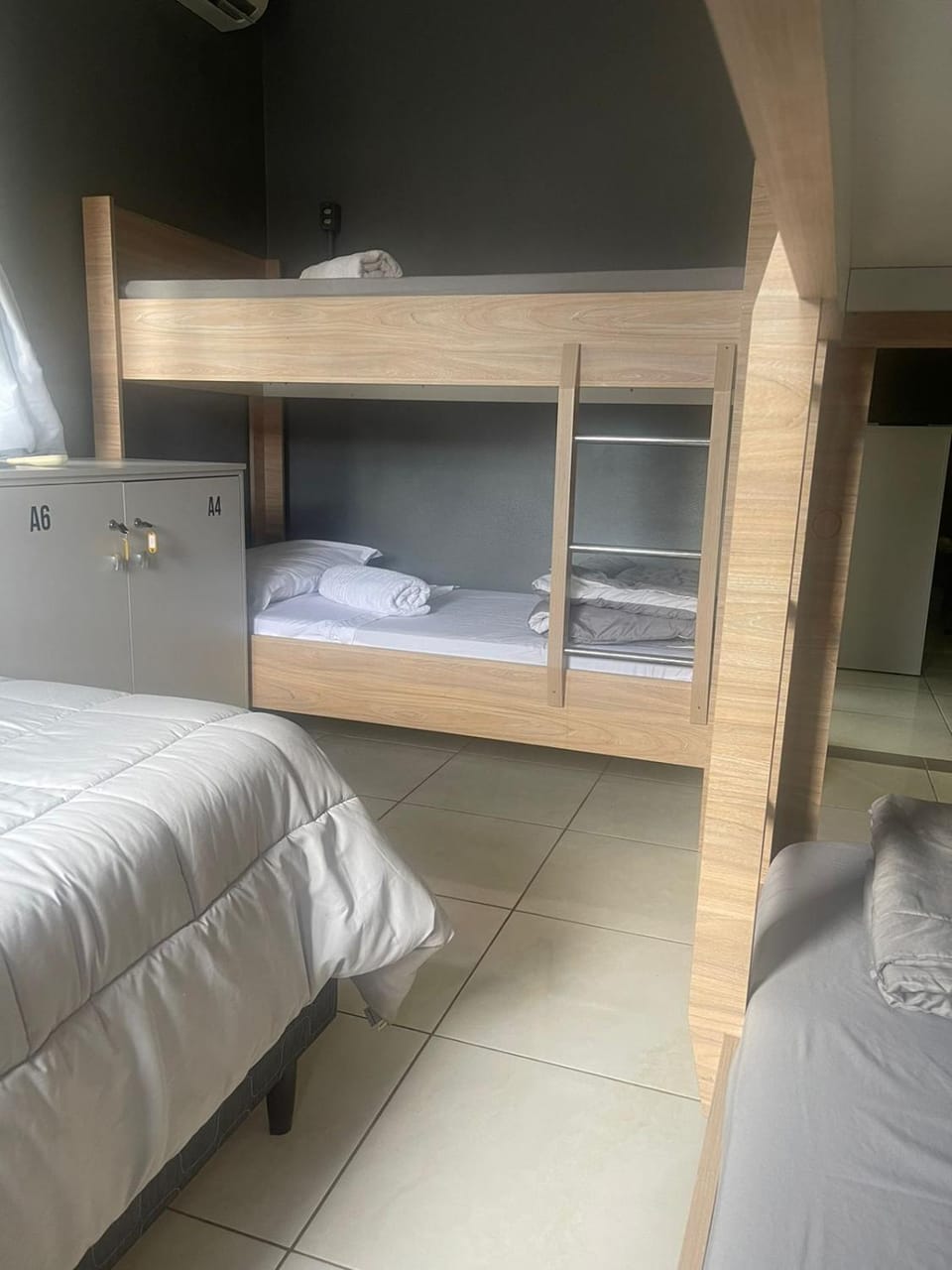 Bed, Photo of the whole room, Bedroom, bunk bed, towels, wardrobe