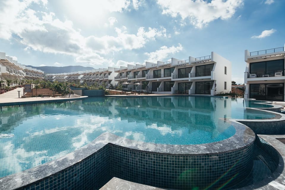 Property building, Nearby landmark, Day, Natural landscape, Mountain view, Pool view, Swimming pool, sunbed