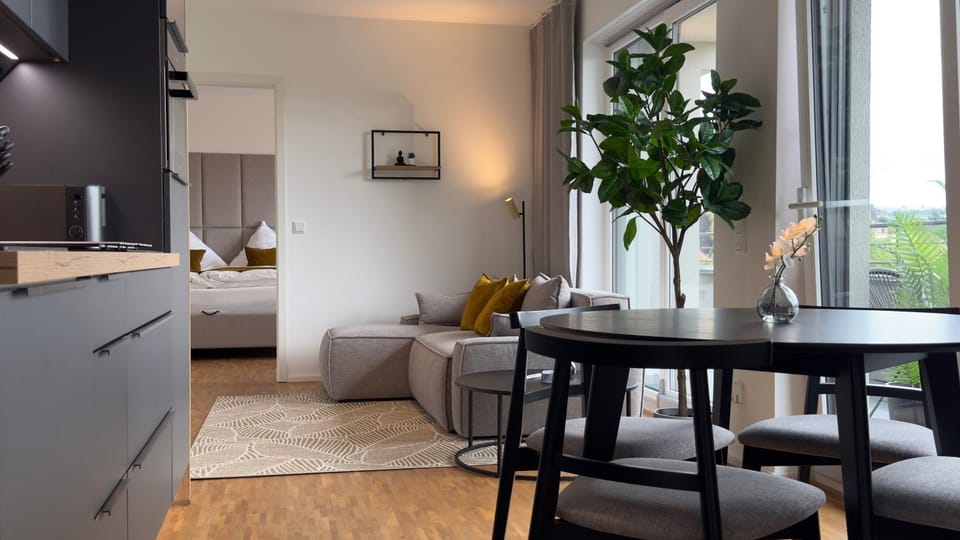 Kitchen or kitchenette, Living room, Seating area, Dining area