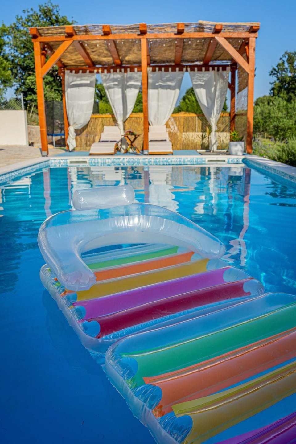 Swimming pool, sunbed
