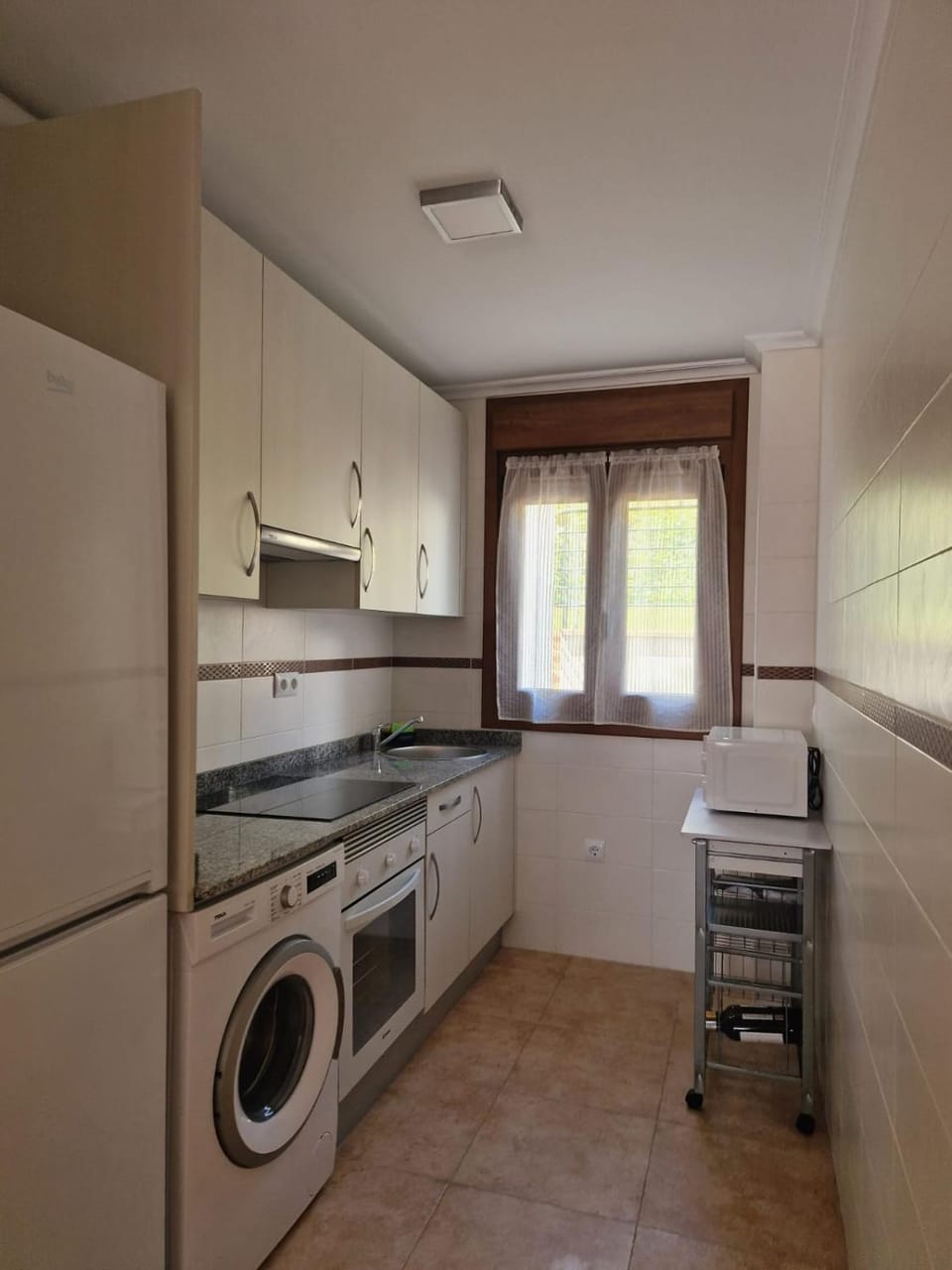 Kitchen or kitchenette, pet friendly, stove, washing machine