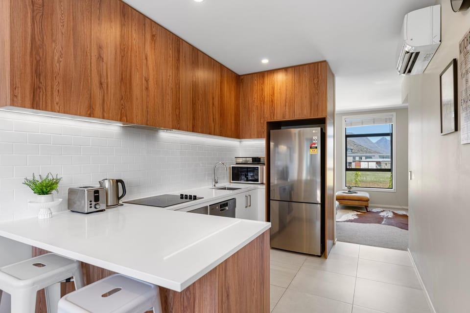 Kitchen or kitchenette, dishwasher, heating, microwave, oven, stove, toaster, kitchen, air conditioner