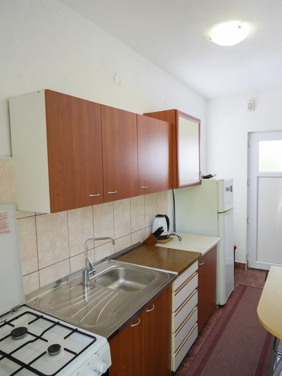 Kitchen or kitchenette, stove