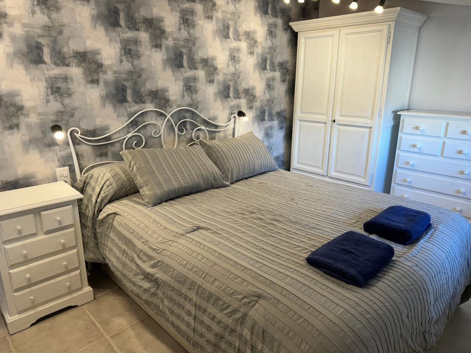 Bed, Photo of the whole room, Bedroom, towels, wardrobe